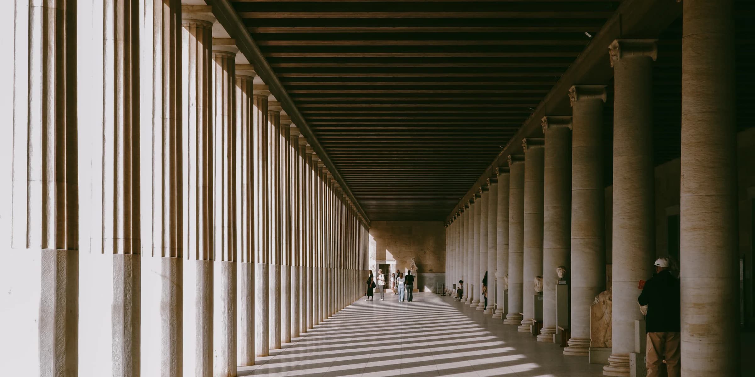 Sunlight striping the colonnade of the Stoa of Attalos